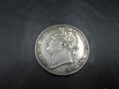 A 1821 George IV Silver Half Crown, in very good condition, needs viewing