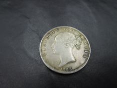 A 1885 Queen Victoria Silver Half Crown, in good condition, needs viewing