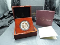 A Royal Mint 2017 Queen Elizabeth II Gold Brilliant Uncirculated Five Sovereign Piece, in plastic