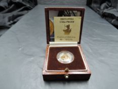 A Royal Mint United Kingdom 1987 Queen Elizabeth II Gold Proof 1/10oz Britannia, in plastic