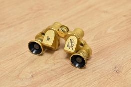 An unusual set of Fata Morgana 4X gilt metal opera glasses, of small proportions
