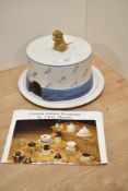 A mid-20th Century studio pottery cheese dome and base, signed J.G Morten to the underside, and