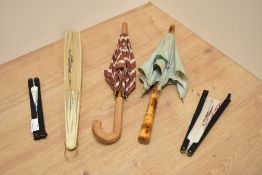 Three vintage silk hand fans, of Chinese interest, and two parasols