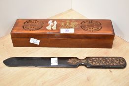 A 20th Century Vietnamese chopstick box, the lid having pierced design and mother of pearl inlay,