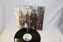 A VG/VG copy of Wildlife by Mott the Hoople with some sleeve wear / tear