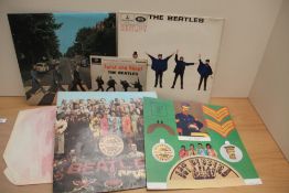 A lot of three VG / VG Beatles albums with an ep