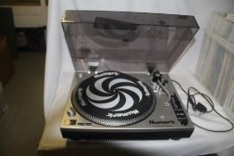 A pair of Numark belt driven turntables - good decks for basic dj-ing