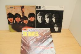 A lot of three early Beatles mono pressings as in photos - VG / VG at least - viewing is
