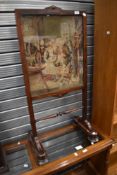 A William IV rosewood firescreen having fine tapestry inset, approx 99 x 49cm