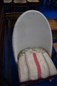 A vintage woven fibre nursing chair (not Lloyd Loom)