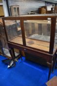 An early 20th Century mahogany display cabinet on cabriole legs, would be ideal for taxidermy, dimen