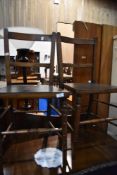 A pair of Victorian bedroom chairs having later plywood seats