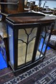 A 1930s china cabinet, approx dimensions W88 D34 H128cm