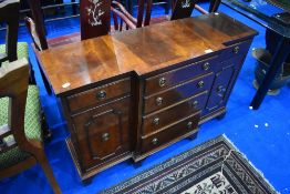 A Reprodux Regency style mahogany dwarf breakfront sideboard, dimensions approx W105 D34 H68cm