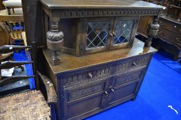 An Old Charm/Priory style court cupboard, width approx 123cm