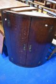 A 19th Century oak bow fronted corner cupboard, height approx. 94cm