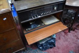A vintage Grundig radiogram and selection of LP records