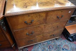 An early 20th Century walnut chest of two over two drawers having ledge back, dimensions approx