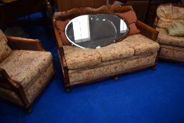 An early 20th Century stained frame and bergere cane three piece suite (af)