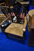 A 19th Century rush seated carver chair