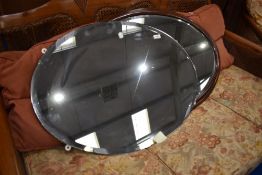Two oval wall mirrors, width approx. 85 and 57cm