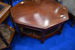 A modern mahogany octagonal coffee table having cane work undertier, , approx 96 x 96cm, height
