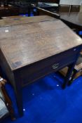 A 19th Century oak clerks desk, approx dimensions H89 W78 D65cm