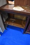 An early 20th century oak tea trolley, having fold out card table top. W 68, D 40, H 78cm.