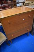 A vintage teak drop front chest, dimensions approx. W76 D48 H93cm