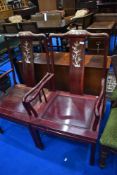 A pair of Oriental hardwood carver chairs having mother of pearl inlay decoration