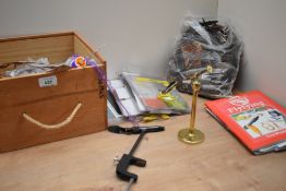 A small wooden crate of fly tying equipment including vice, feathers and a lovely brass mounted
