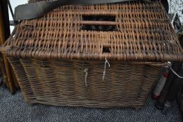 A wicker fishing basket measuring 50cm x 35cm x 37cm