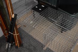 A double top entry Larsen trap with ready cut split perches