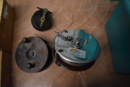 Three vintage reels an Alvey snapper 615c reel and two wood and brass reels
