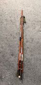 Four vintage beach caster rods one marked Felltrade poole and an Abu Garcia Beach Max 3100 10ft 2pc