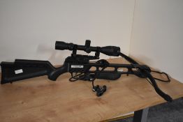 A Jaguar crossbow with Simmons 4-12x40 telescopic scope attached
