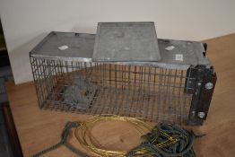 10 x unused brass rabbit snares without pegs and a small humane mammal trap