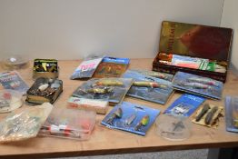 A box of spinners Lures and perks many unused in original packaging