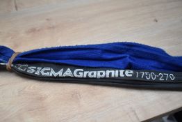 Two Shakespeare fly rods in soft cases. An Alpha Graphite rod 2pc 9ft #8-9 and a Sigma Graphite
