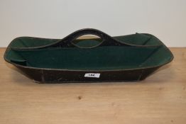 A vintage toleware cutlery tray, with handle to centre of two compartments.