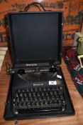A vintage Remington 'Remette' type writer.