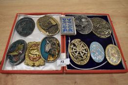 A collection of modern enamelled metal belt buckles, of fishing, and Western Cowboy interest,