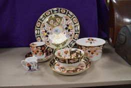 A Royal Crown Derby breakfast cup and saucer with 1930 date mark and similar styled ceramics in