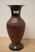 A 20th Century Continental metal vase, of Japanese style, with lobed and fluted body, measuring 32cm