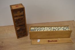 A set of 55 Dominoes in box ( with 9 dots) and a Jenga set.