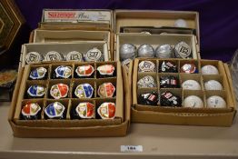 A good quantity of retro golf balls, mostly new in packaging.