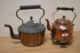 An early 20th Century copper electric kettle, with turned wood handle, measuring 25cm tall, and