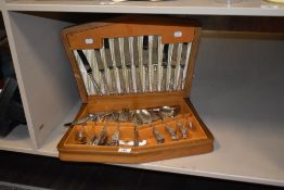 A vintage canteen containing a selection of silver plated cutlery.