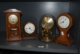 An Edwardian balloon shaped mantel clock, having inlaid satin wood decoration, AF, A wooden cased