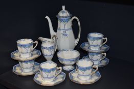 An Art Deco Royal Doulton coffee service, Arvon patterned, and comprising coffee pot, sucrier,